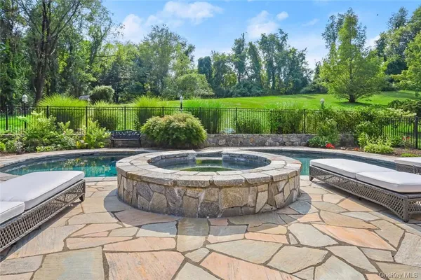 a view of a park with large trees