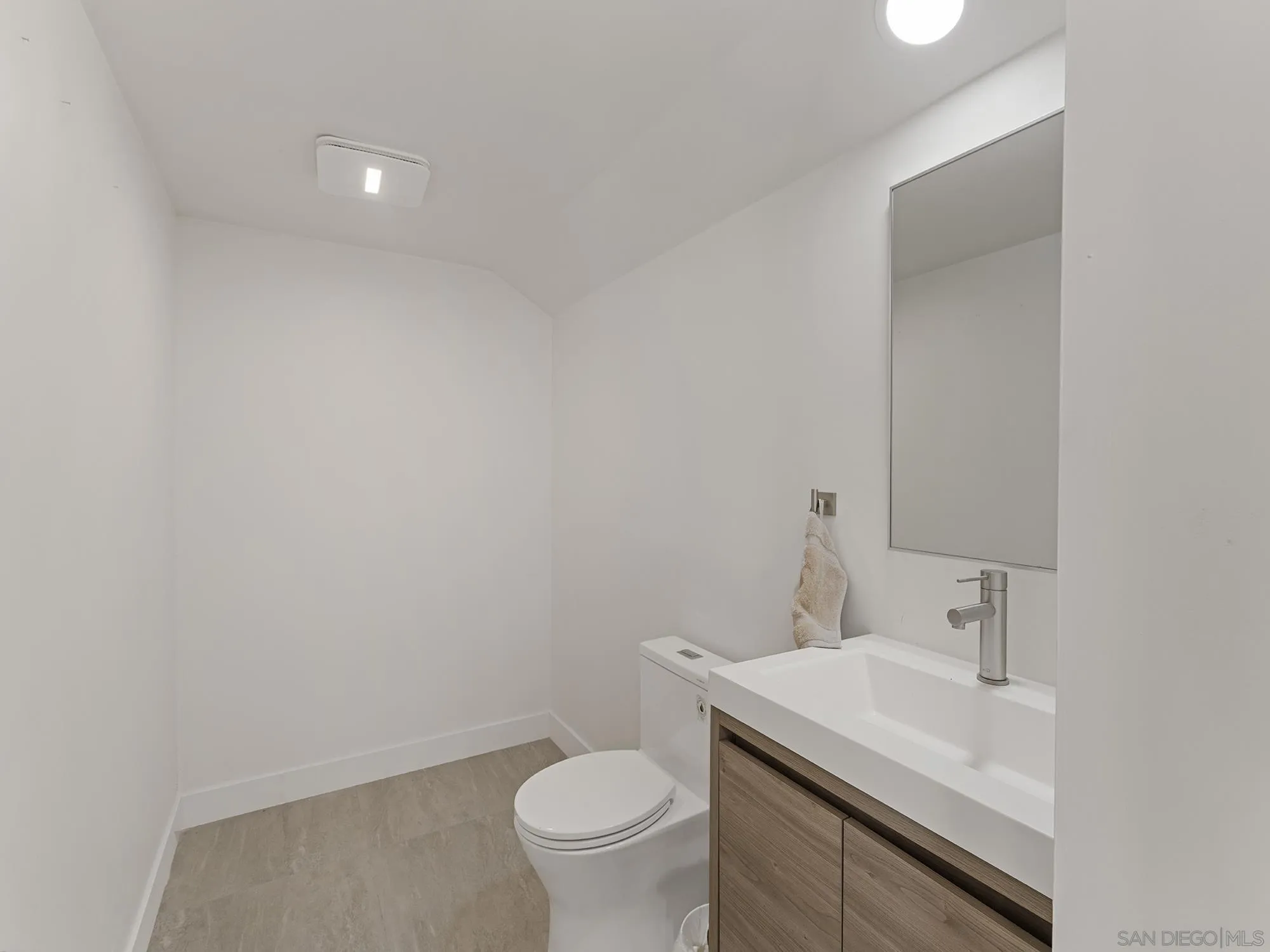 17515 Circa Oriente Rancho Santa Fe, CA 92067 - Photo 31 of 37 This half bathroom was nicely remodeled, still has plumbing to return it to a FULL Bathroom by adding a shower back in.