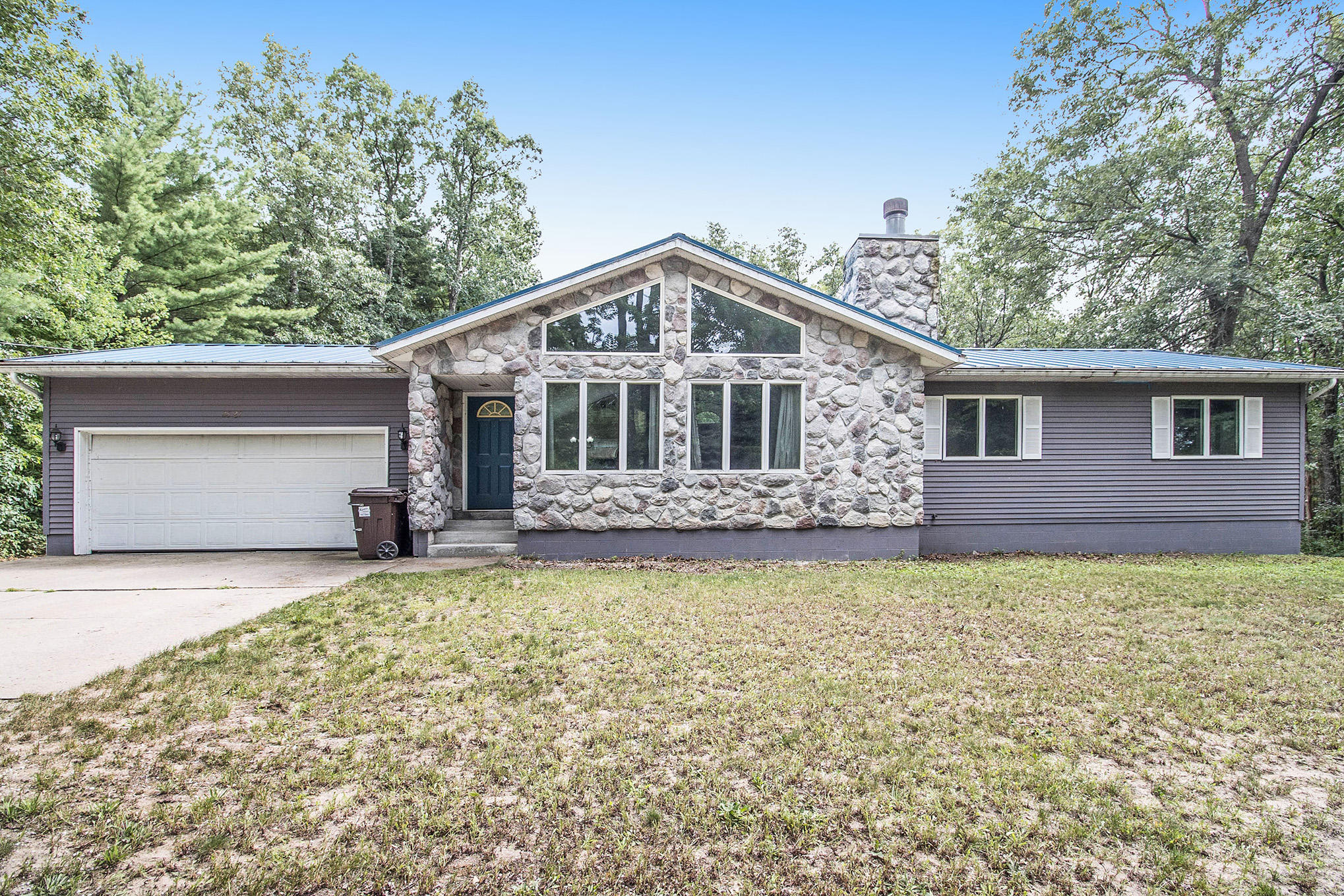 2827 Duff Road Twin Lake, MI 49457 - Photo 1 of 32 BH2A3603
