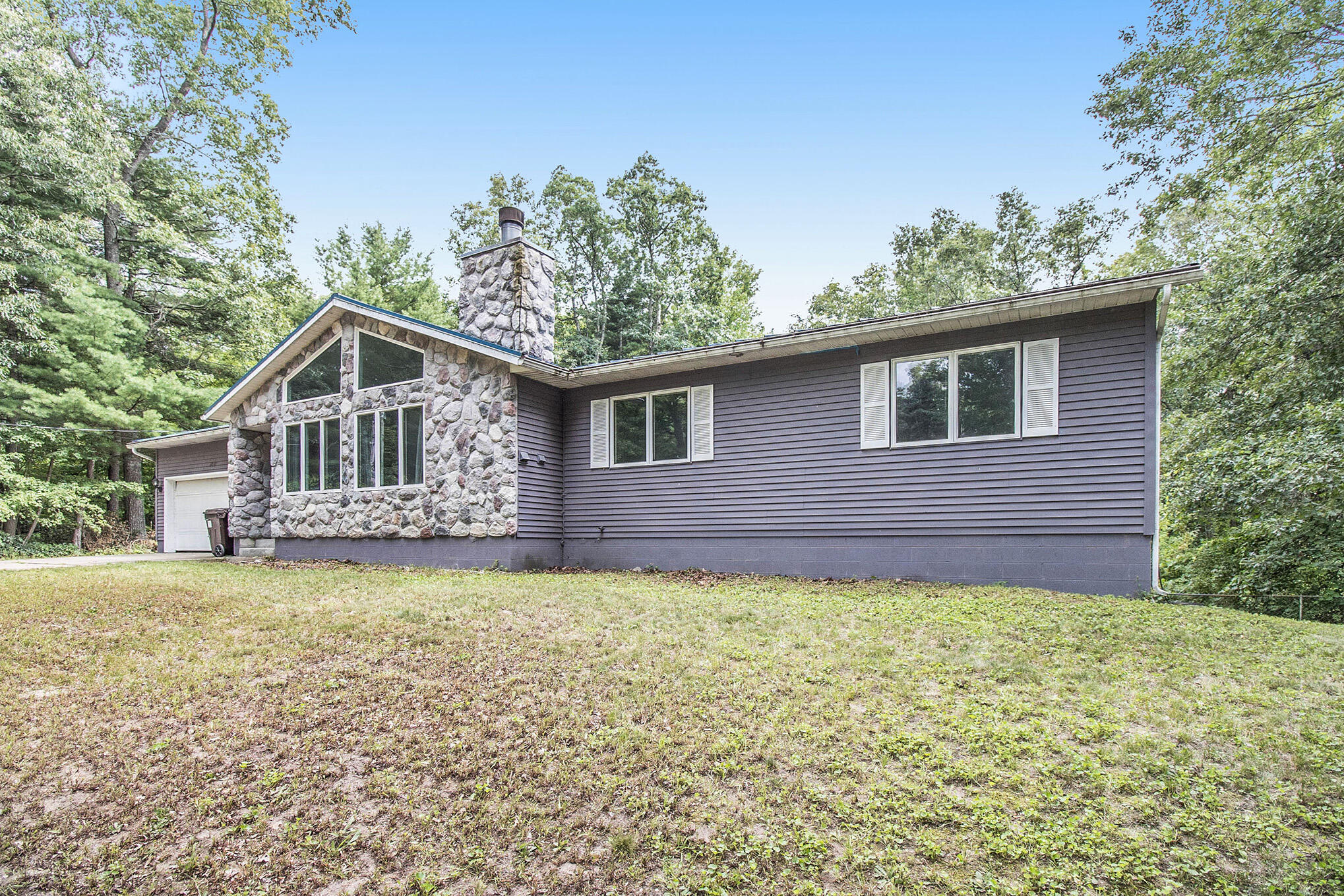 2827 Duff Road Twin Lake, MI 49457 - Photo 2 of 32 BH2A3605