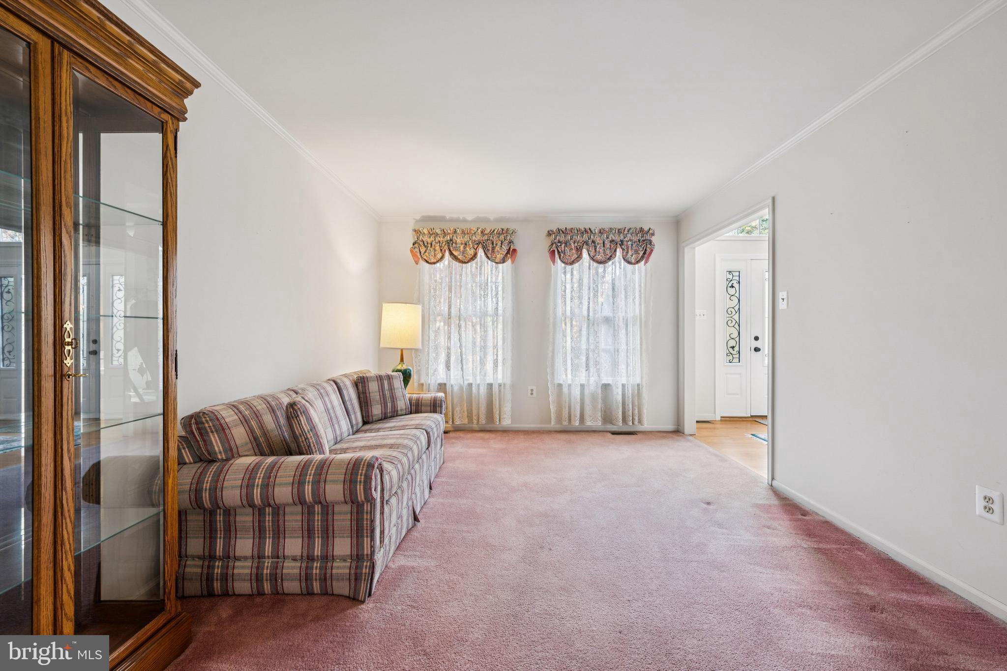 32 Constitution Drive Southampton, NJ 08088 - Photo 5 of 31 a living room with furniture and a large window
