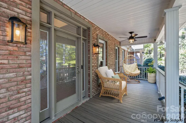 a view of a balcony with wooden floor