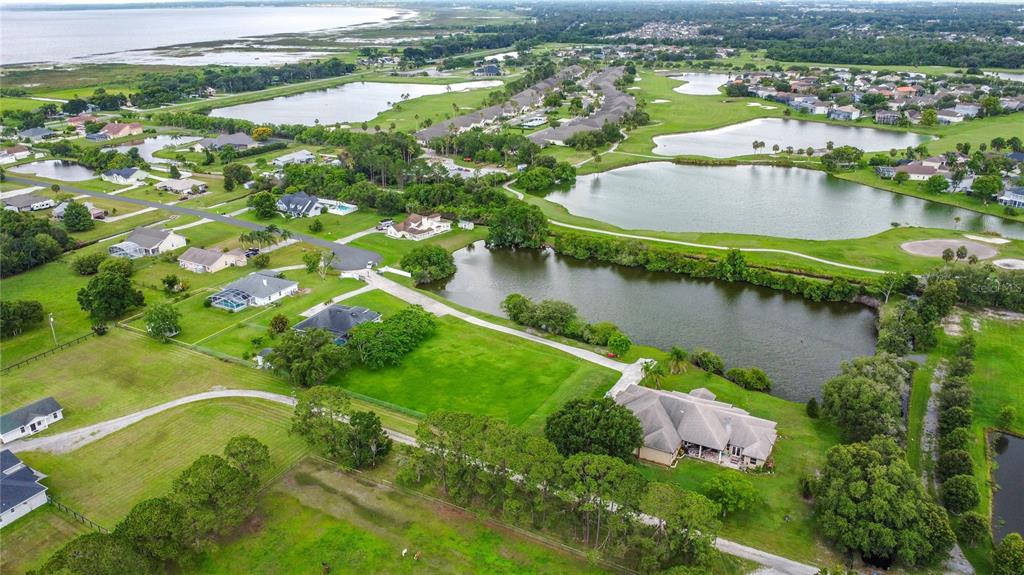 2959 Monica Terrace Kissimmee, FL 34744 - Photo 15 of 23 an aerial view of residential houses with outdoor space and lake view