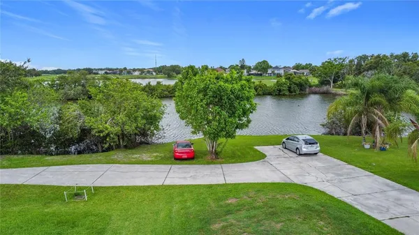 a view of a garden with a lake