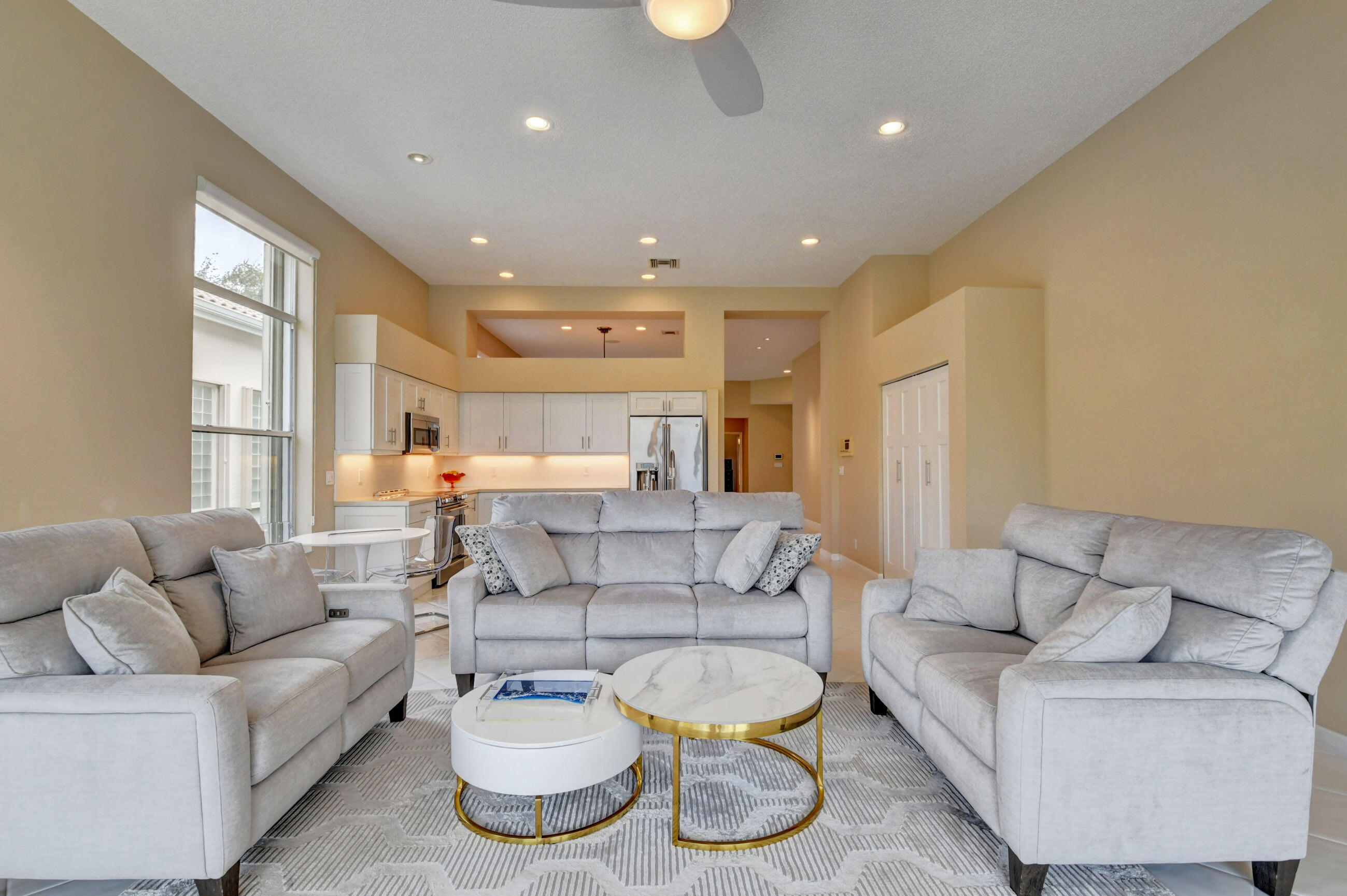 2331 Northwest 66th Drive Boca Raton, FL 33496 - Photo 19 of 71 a living room with furniture and a large window