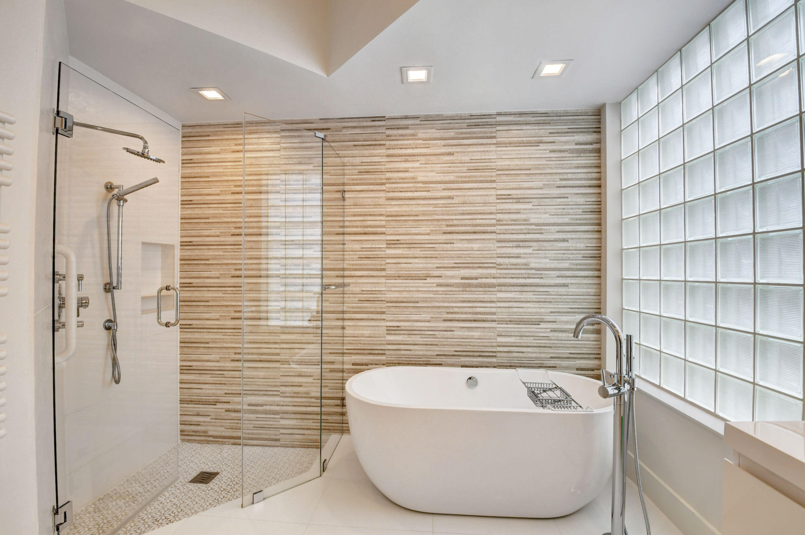 2331 Northwest 66th Drive Boca Raton, FL 33496 - Photo 29 of 71 a bathroom with a bathtub and shower