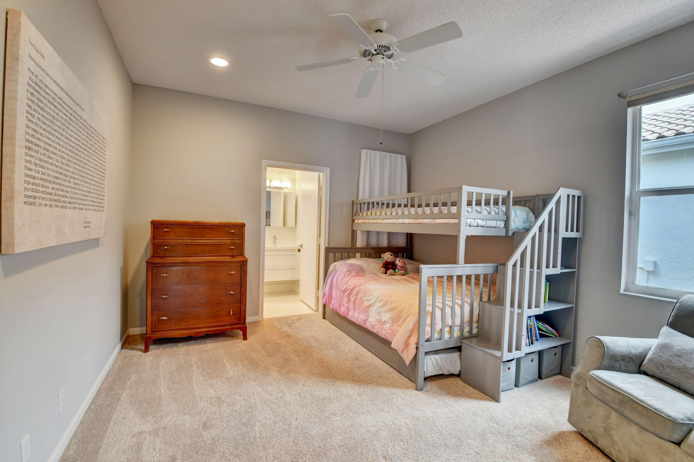 2331 Northwest 66th Drive Boca Raton, FL 33496 - Photo 31 of 71 a bedroom with furniture and a window