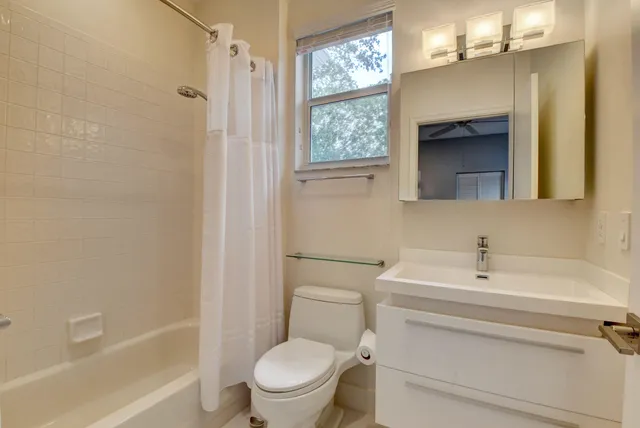 a view of a dining room with furniture wooden floor and chandelier