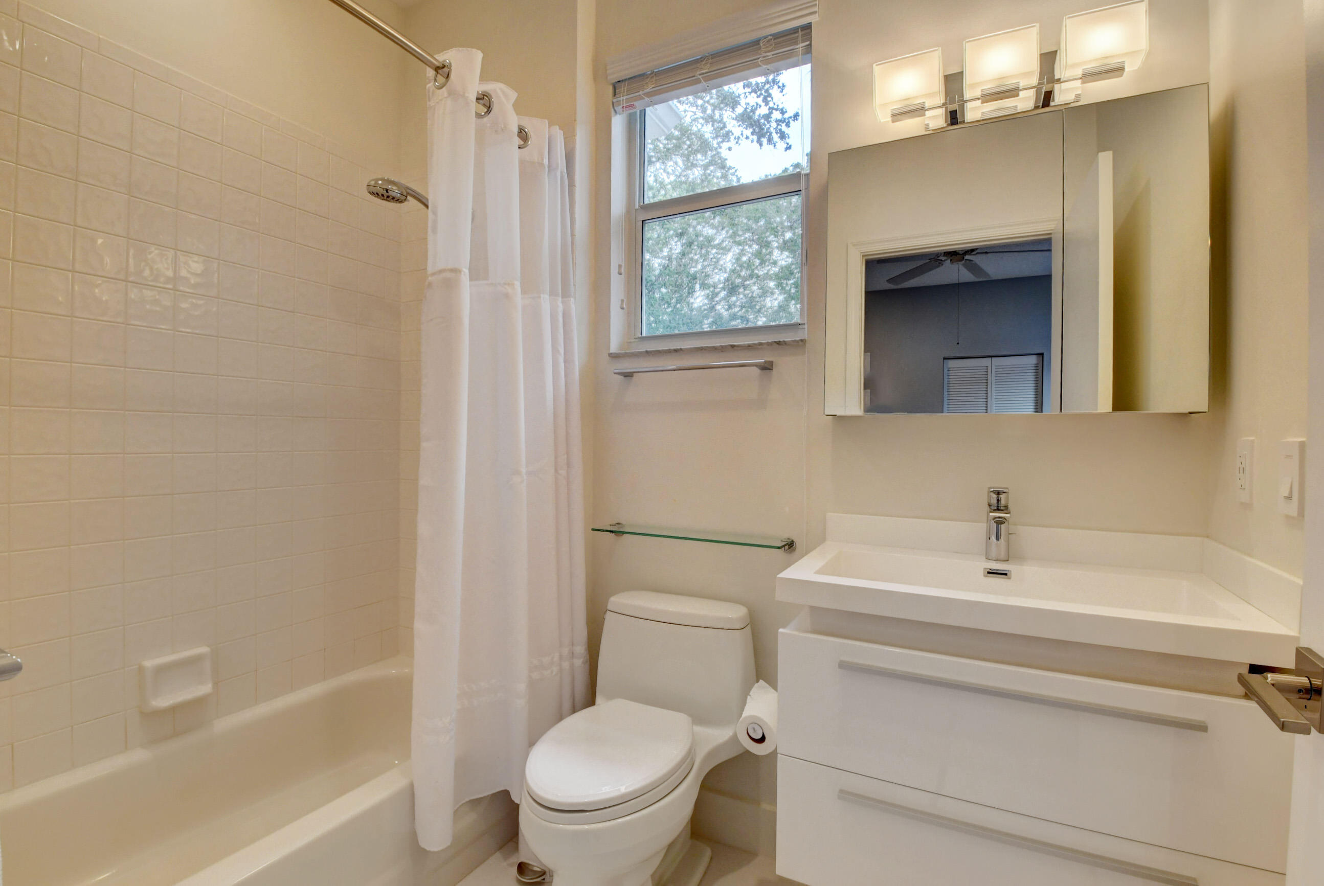 2331 Northwest 66th Drive Boca Raton, FL 33496 - Photo 33 of 71 a bathroom with a sink toilet and shower