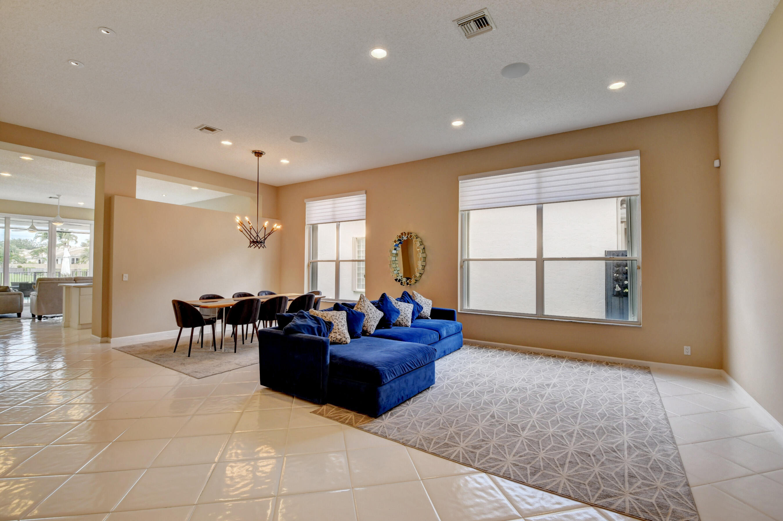 2331 Northwest 66th Drive Boca Raton, FL 33496 - Photo 9 of 71 a living room with furniture and a large window