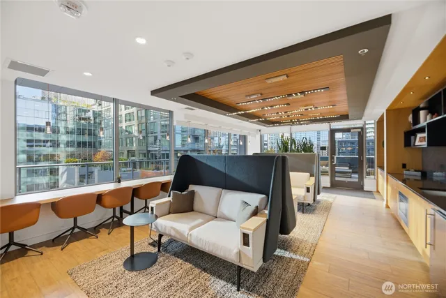 a kitchen with stainless steel appliances granite countertop a stove and cabinets