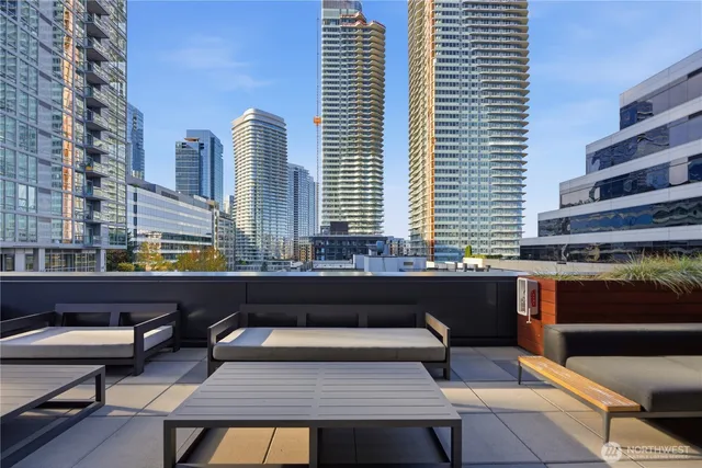 a dinning area with pool table and chairs