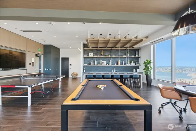 a view of a dining room with furniture window and outside view