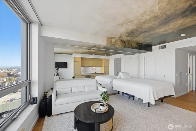 a living room with furniture and a table