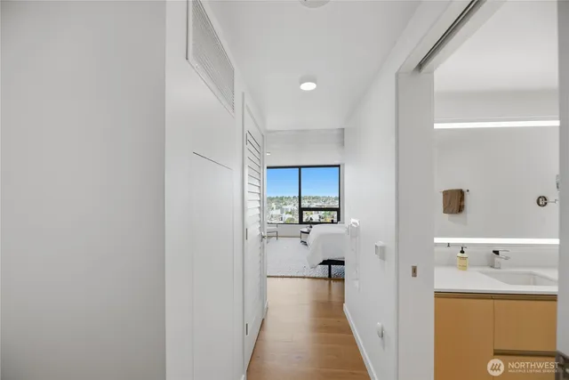 a bathroom with a sink and mirror