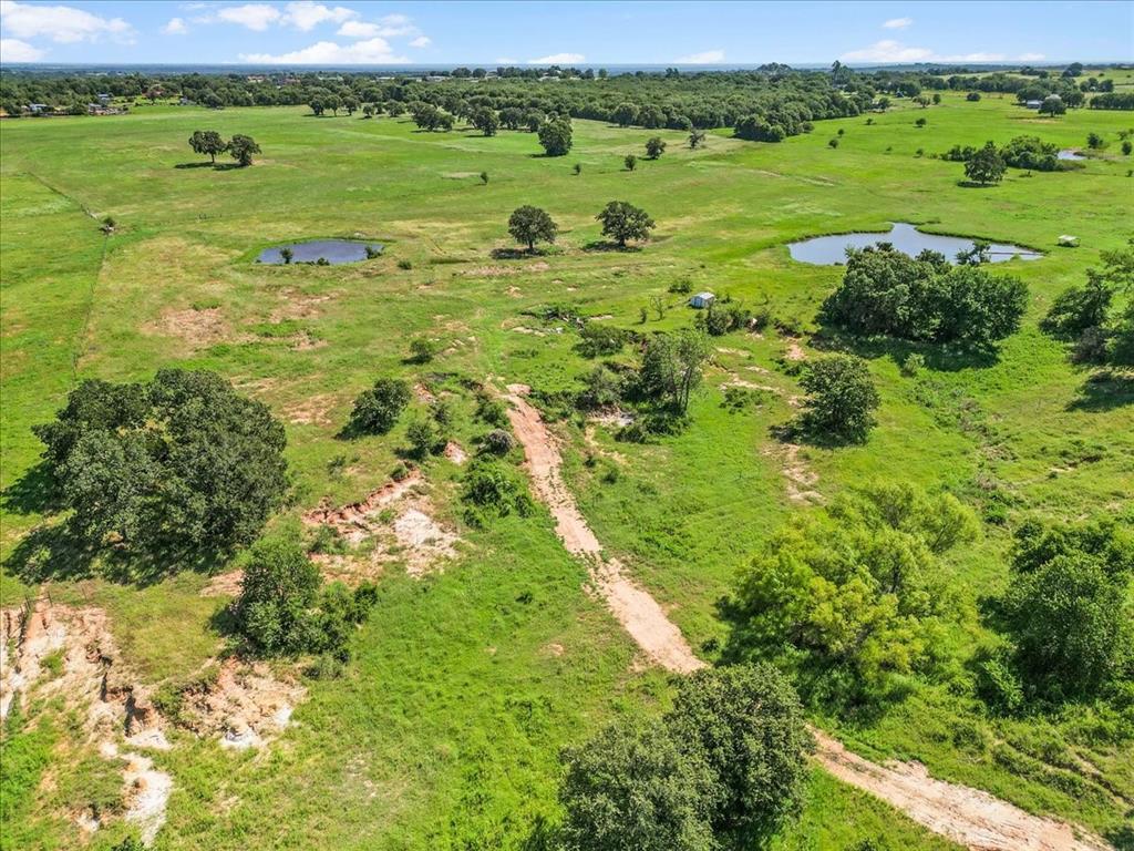 1330 Midway Drive Springtown, TX 76082 - Photo 15 of 16 Aerial view of one of the property's entrances