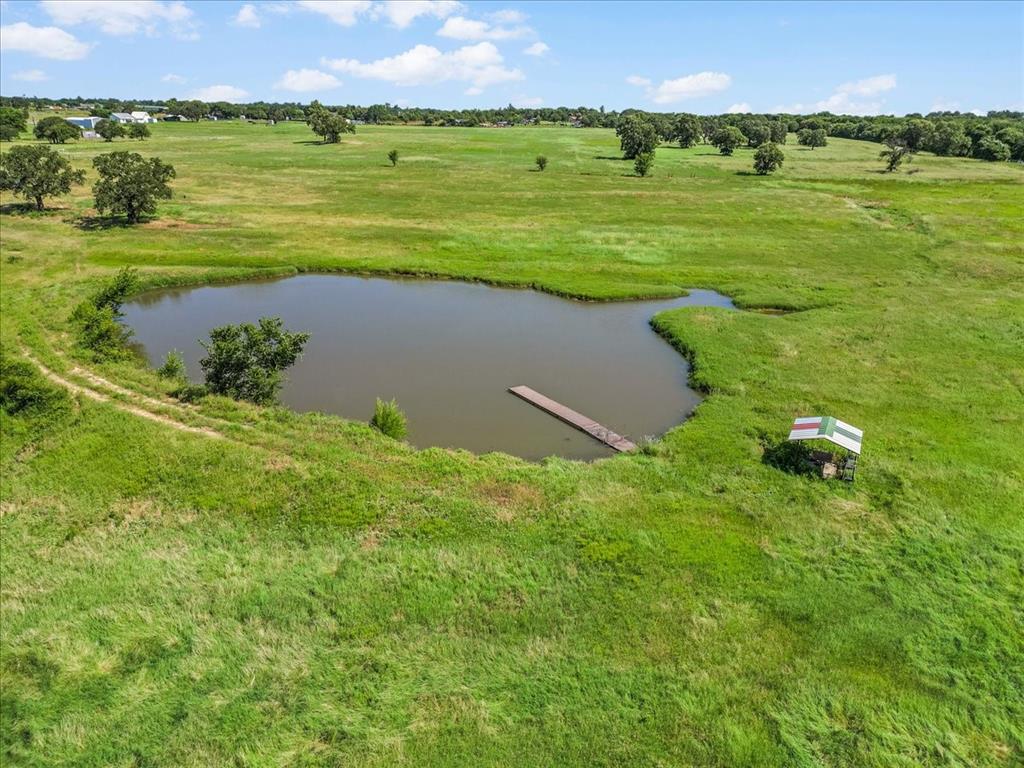 1330 Midway Drive Springtown, TX 76082 - Photo 2 of 15 One of the 3 tanks