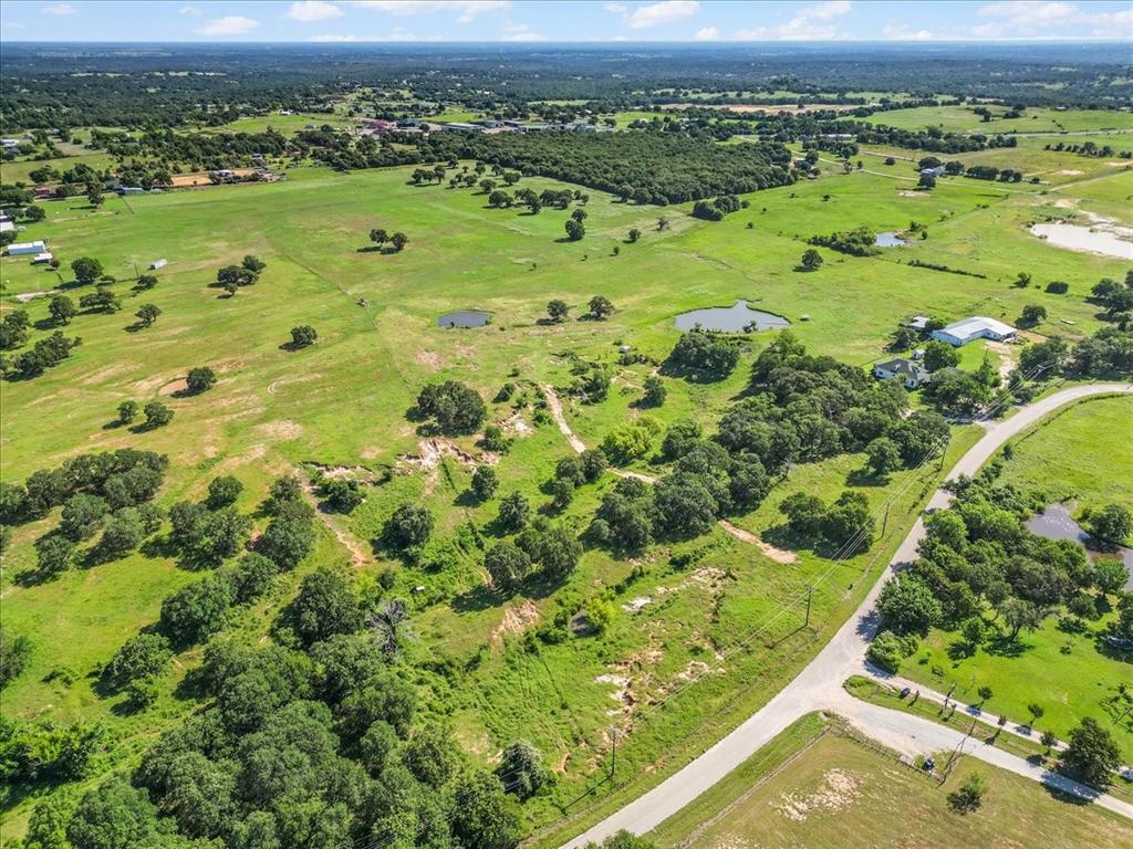 1330 Midway Drive Springtown, TX 76082 - Photo 6 of 15 Aerial view of property's road frontage.