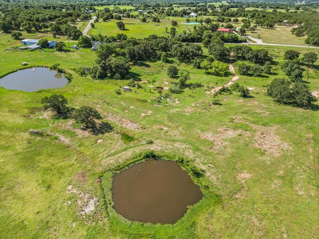1330 Midway Drive Springtown, TX 76082 - Photo 7 of 15 Aerial view of property's 2 tanks