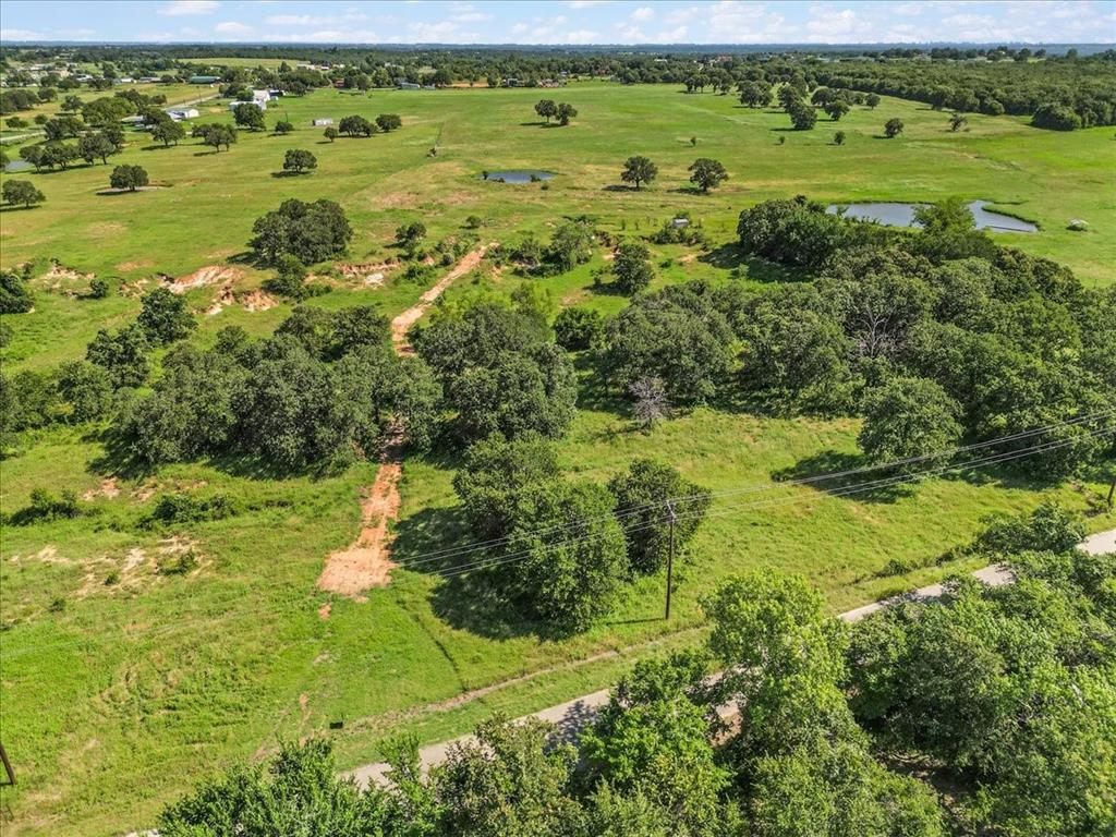 1330 Midway Drive Springtown, TX 76082 - Photo 8 of 15 Aerial view of property's road frontage.