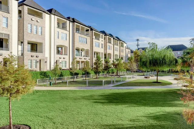 a front view of a building with garden