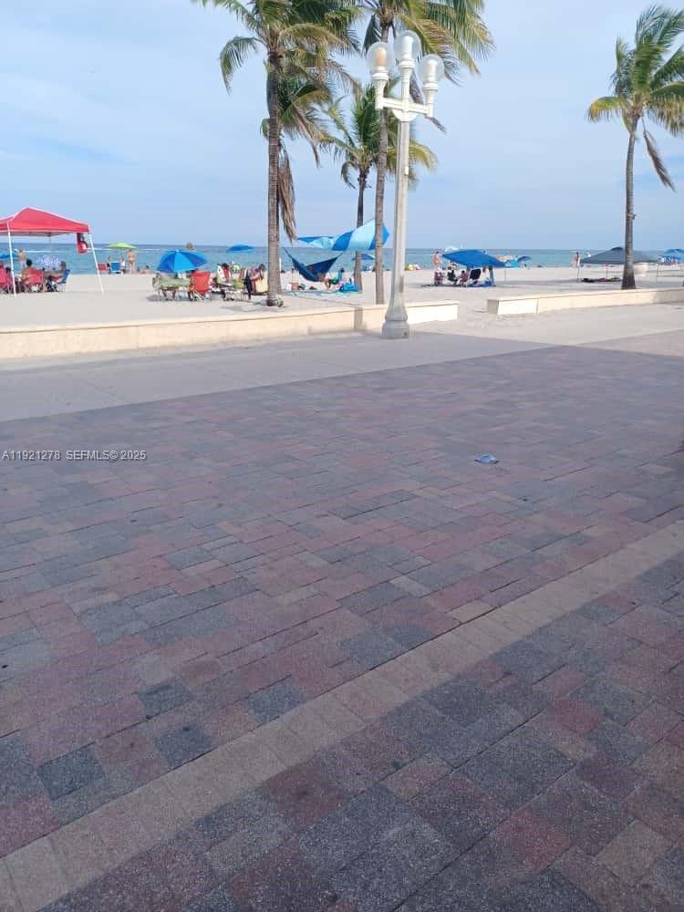 322 Nebraska Street, Unit 1 Hollywood, FL 33019 - Photo 2 of 3 a view of a living room and utility room