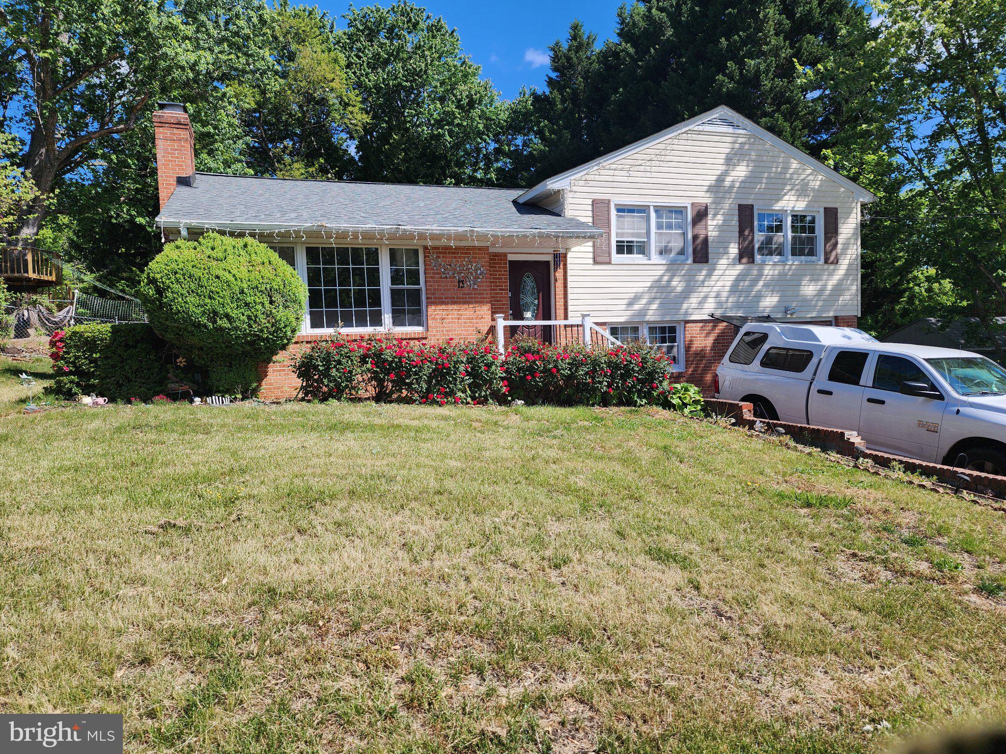 13 Main Street Huntingtown, MD 20639 - Photo 2 of 32 Charming split-level home with lush garden.