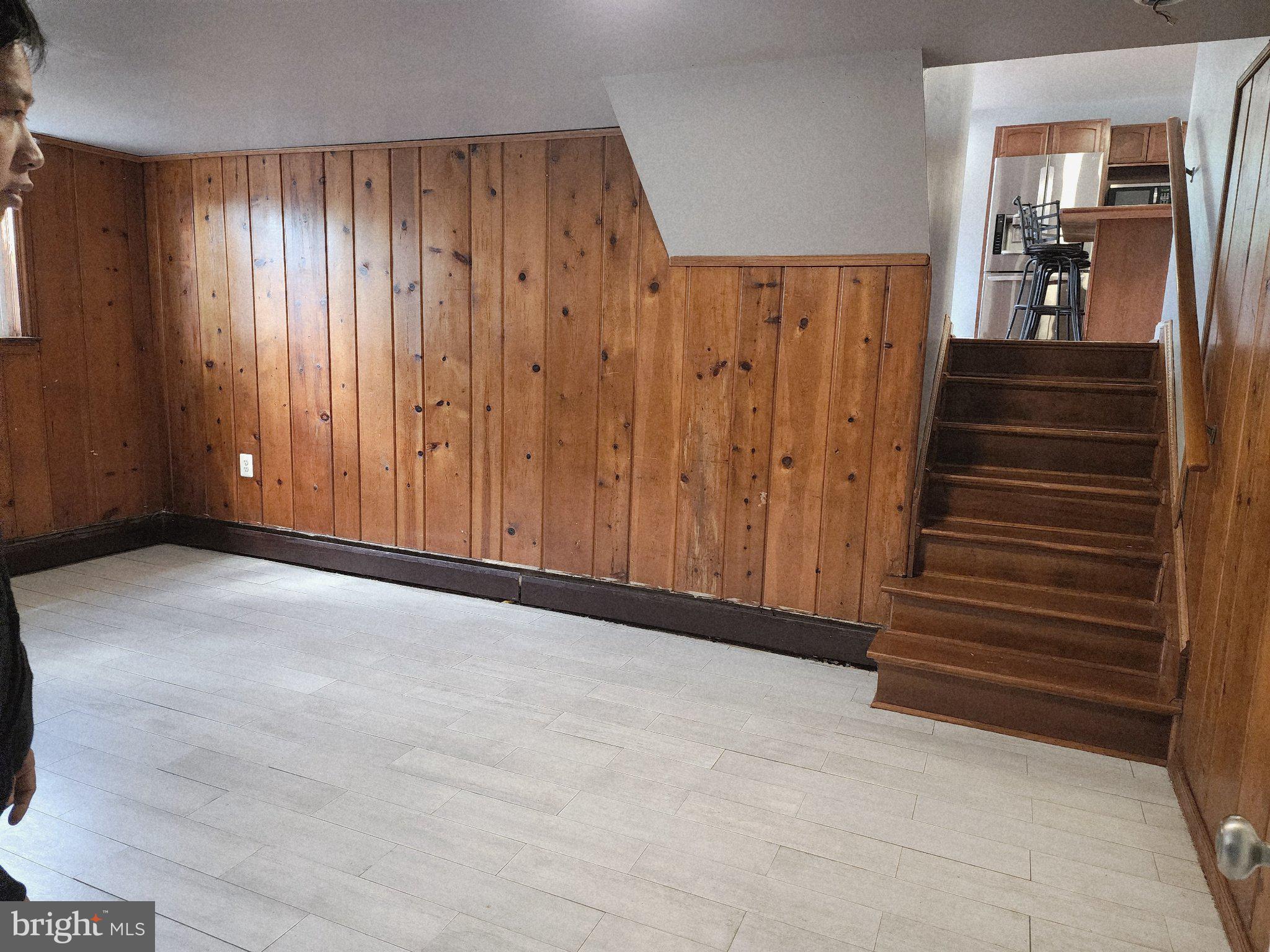 13 Main Street Huntingtown, MD 20639 - Photo 24 of 32 Cozy basement with warm wood accents.