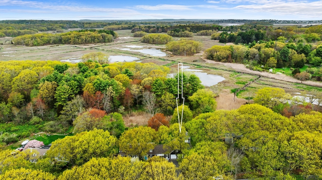 128 Argilla Road Ipswich, MA 01938 - Photo 3 of 25 a view of a lake with a mountain