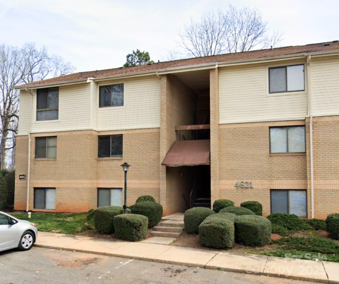 4821 Spring Lake Drive, Unit C Charlotte, NC 28212 - Photo 1 of 5 a house that has a sign on it