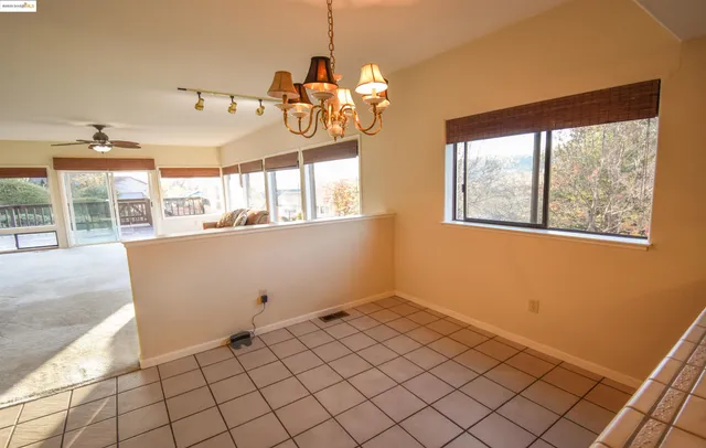 a view of a room with windows