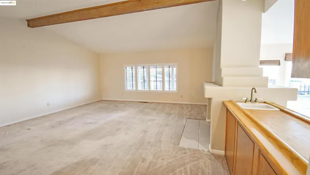 a bathroom with a sink a vanity and a bathtub