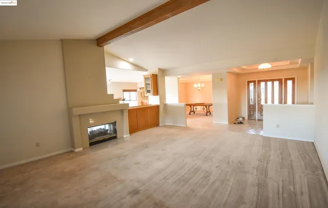 a view of a kitchen with furniture and a kitchen