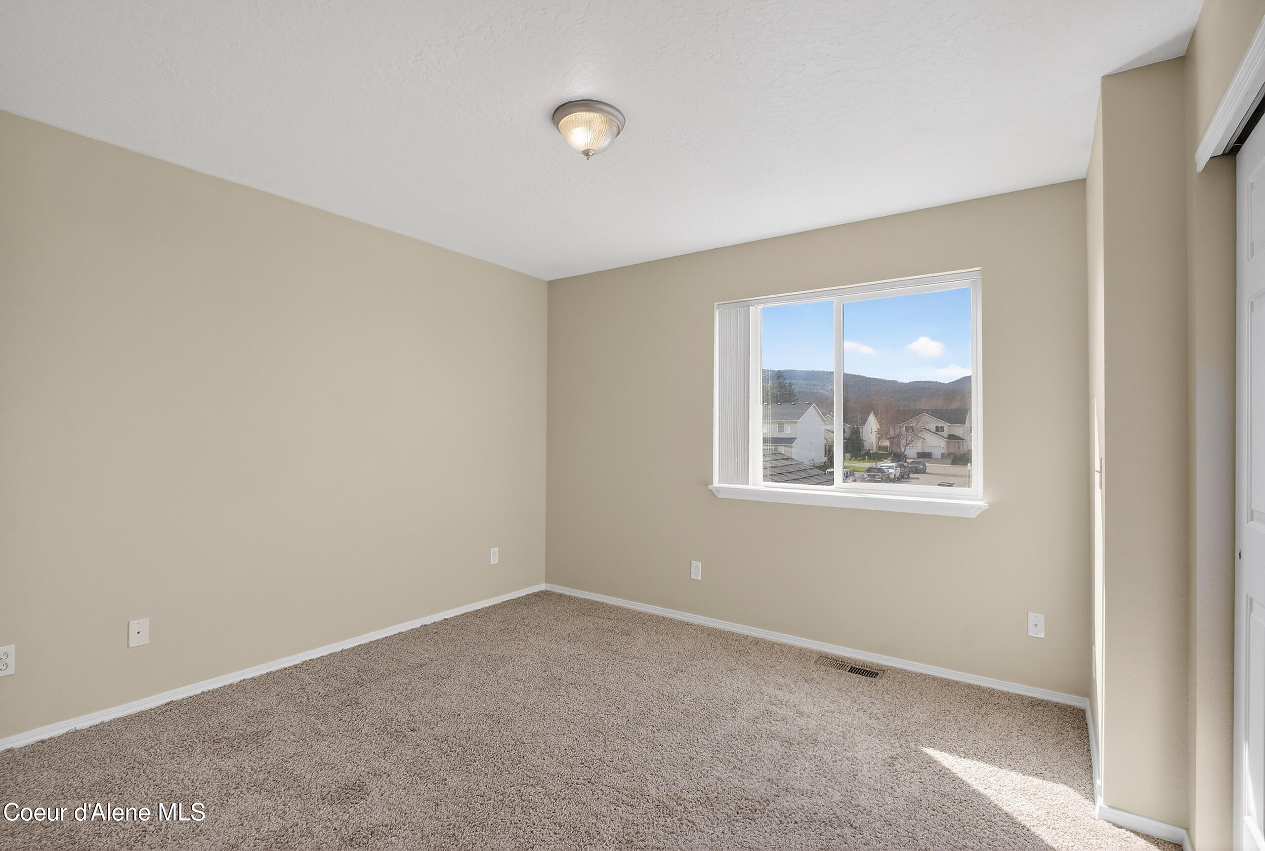692 Hydra Place, Unit A Post Falls, ID 83854 - Photo 12 of 24 Primary bedroom