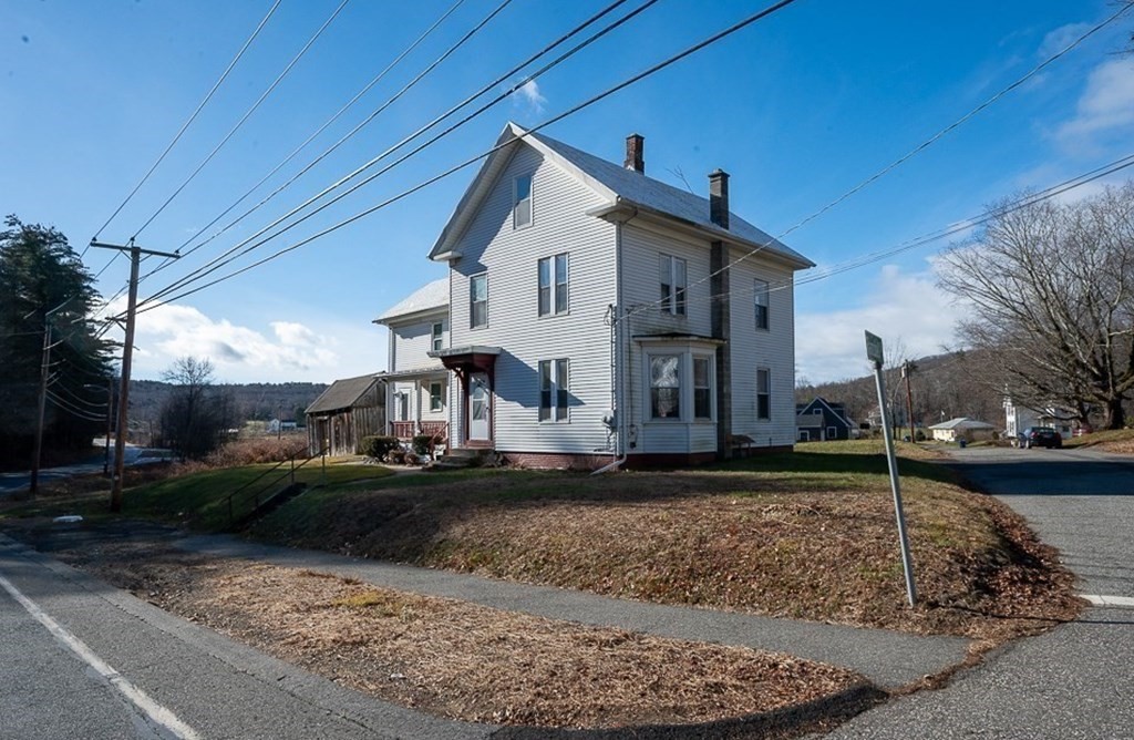 7 Ramsdell Street Warren, MA 01083 - Photo 1 of 34 a front view of a house with garden
