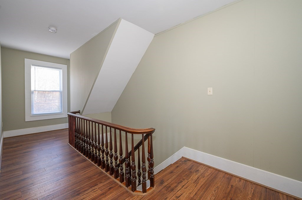 7 Ramsdell Street Warren, MA 01083 - Photo 11 of 34 a view of a hallway with wooden floor and windows