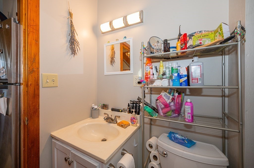 7 Ramsdell Street Warren, MA 01083 - Photo 26 of 34 a utility room with lots of clutter and cabinets
