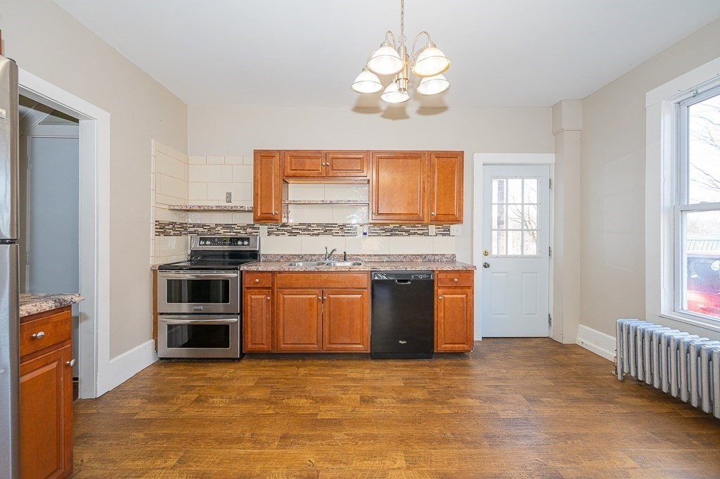 7 Ramsdell Street Warren, MA 01083 - Photo 3 of 34 a kitchen with stainless steel appliances granite countertop a stove and a refrigerator