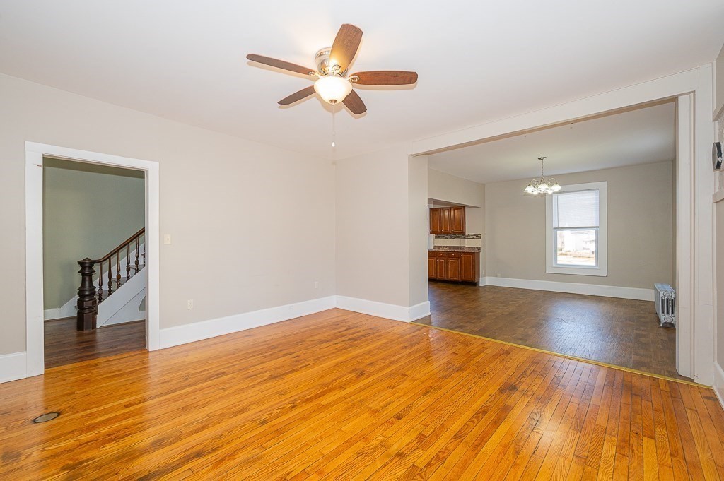 7 Ramsdell Street Warren, MA 01083 - Photo 9 of 34 wooden floor in an empty room with a window
