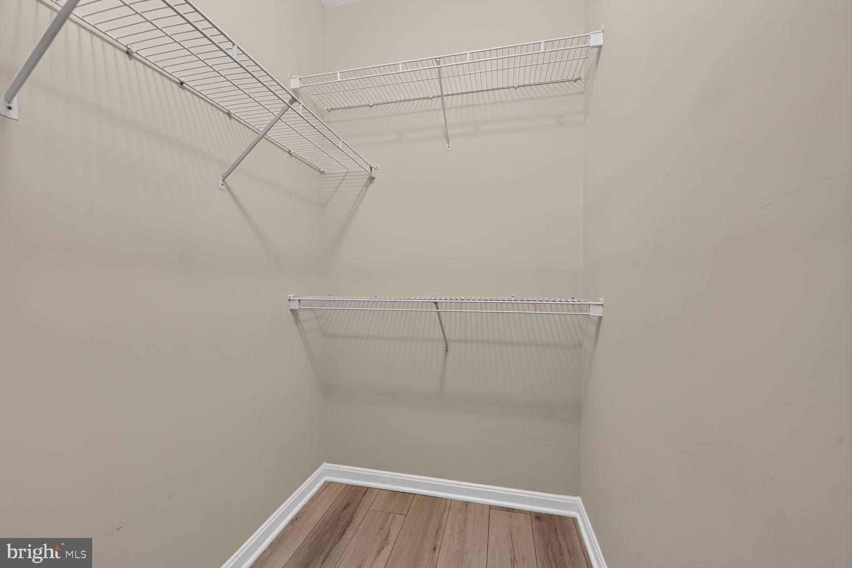 11775 Stratford House Place, Unit 112 Reston, VA 20190 - Photo 24 of 53 Walk-In Closet