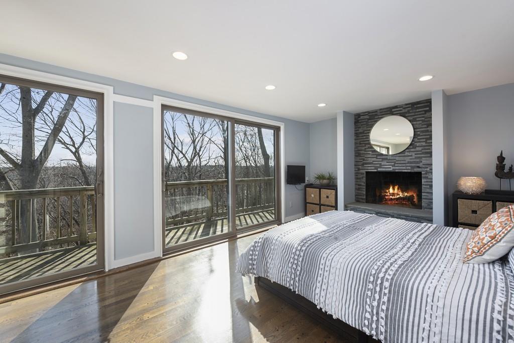 38 Rice Road Hingham, MA 02043 - Photo 22 of 41 a bedroom with a large bed and a large window
