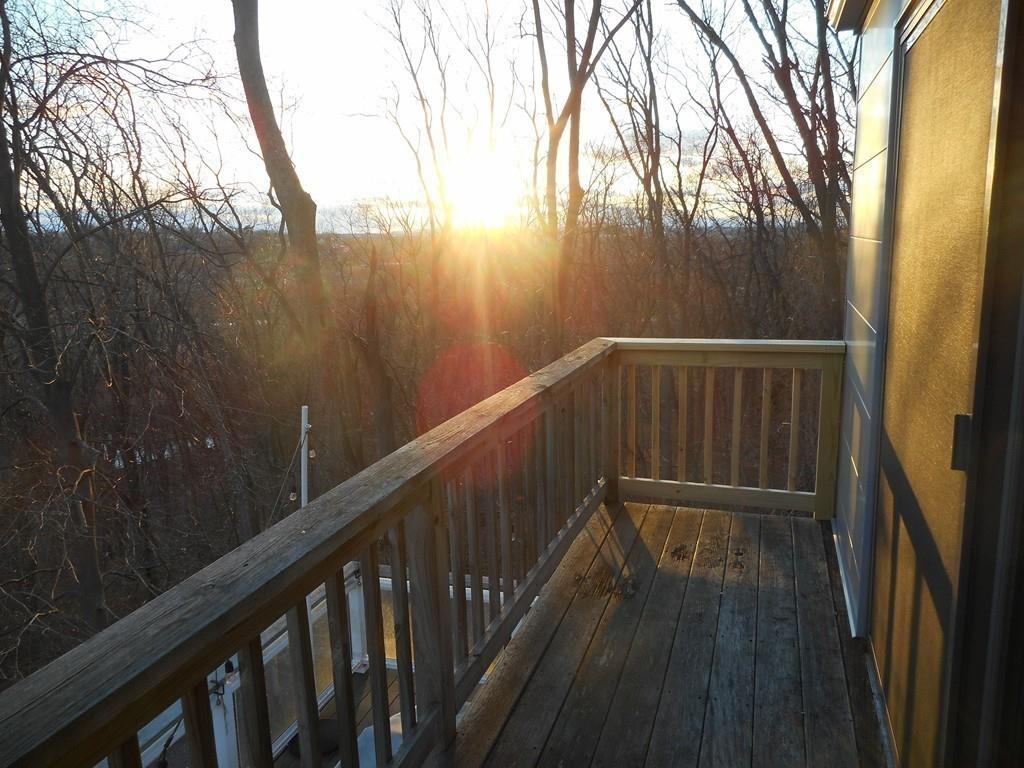 38 Rice Road Hingham, MA 02043 - Photo 25 of 41 a view of balcony with wooden floor and fence
