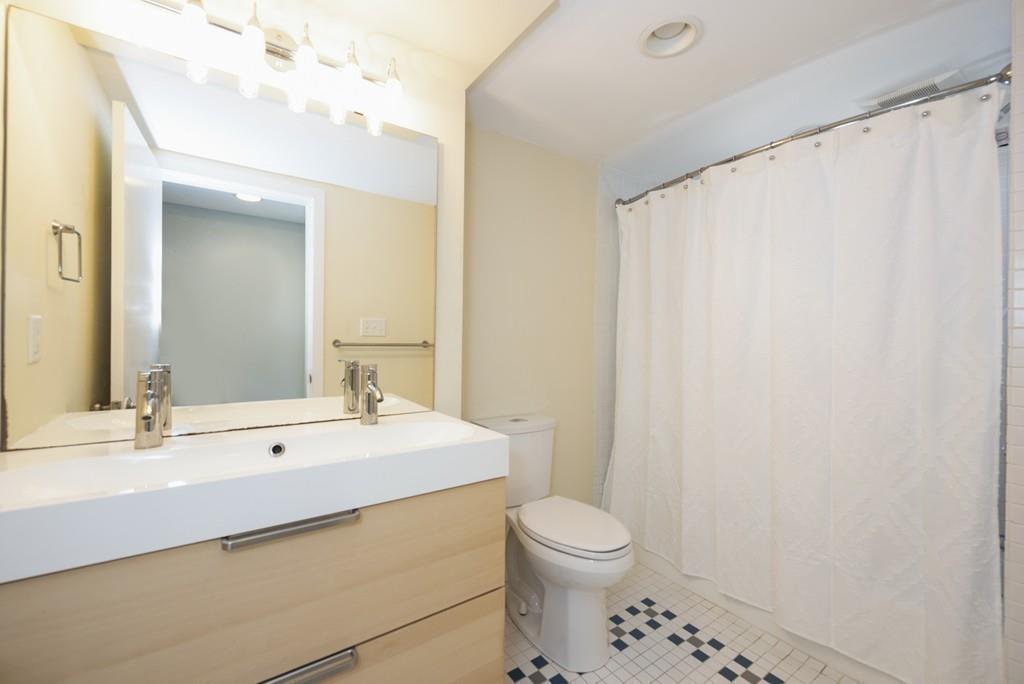 38 Rice Road Hingham, MA 02043 - Photo 36 of 41 a bathroom with a sink a toilet and mirror