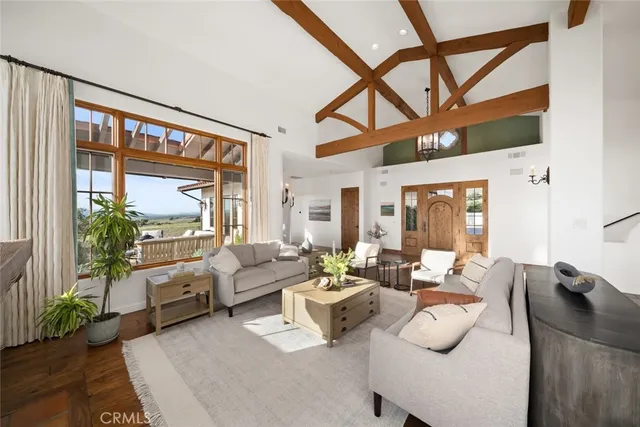 a terrace with outdoor seating and city view