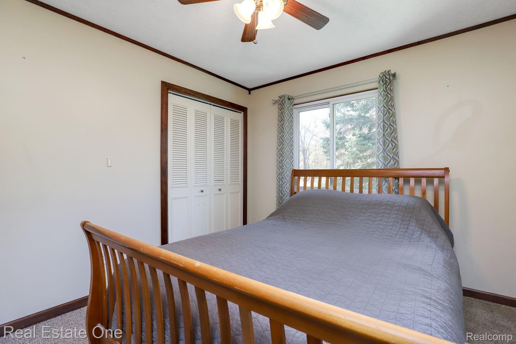 6645 Dunn Road Howell, MI 48855 - Photo 26 of 47 Ceiling Fans Throughout