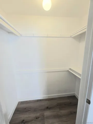 a view of small space with racks on the wall