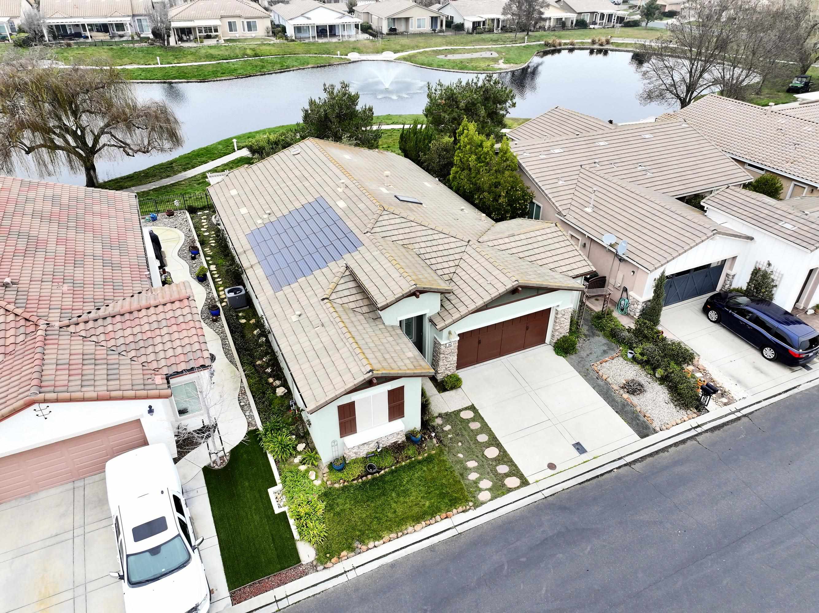 342 Desert Forest Court Rio Vista, CA 94571 - Photo 14 of 40 Aerial perspective of suburban area featuring a large body of water