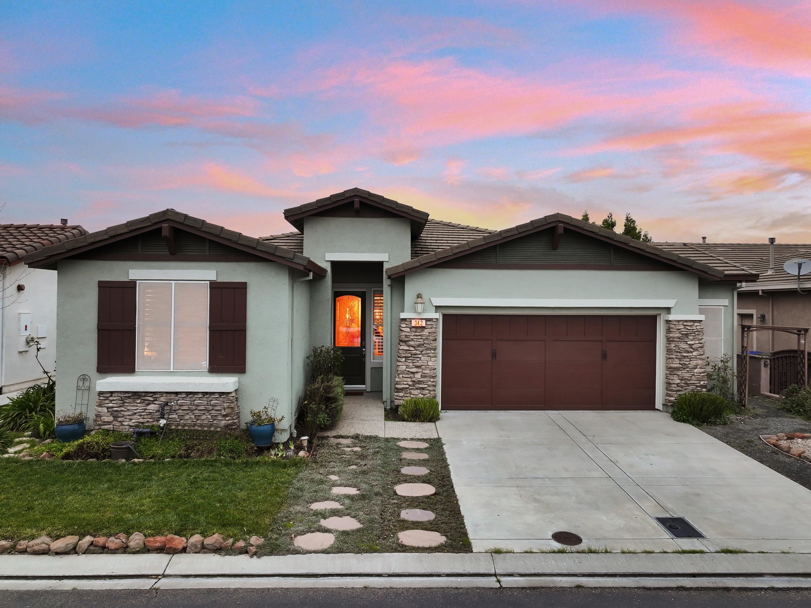 342 Desert Forest Court Rio Vista, CA 94571 - Photo 2 of 40 View of front of house featuring stone siding and a tiled roof