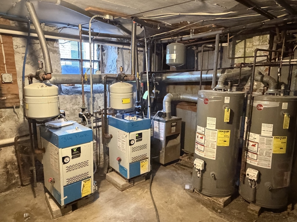 582 Cambridge Street Fall River, MA 02721 - Photo 19 of 19 a utility room with dryer and washer