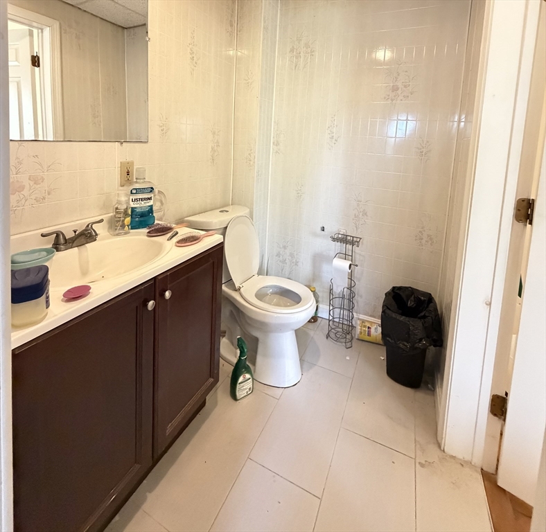 582 Cambridge Street Fall River, MA 02721 - Photo 9 of 19 a bathroom with a sink toilet and a shower